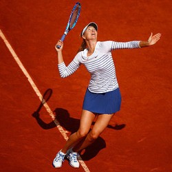 Sharapova Melaju Mulus ke Babak Ketiga