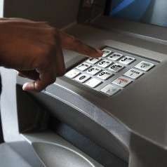 ATM Merger Bank BUMN Bisa Mulai Dipakai Pertengahan Juli 2015