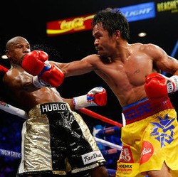 Kondisi Lengan Membaik, Pacman Siap Rematch dengan Mayweather Tahun Depan