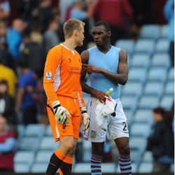 Leganya Mignolet Tak Harus Hadapi Benteke Lagi