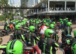 Bolehkah Pengemudi GrabBike Nyambi Go-Jek?