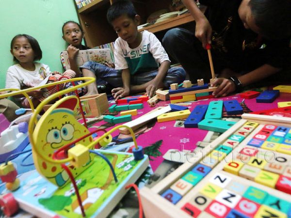 Perpustakaan dan Layanan Kesehatan di Pasar Manggis