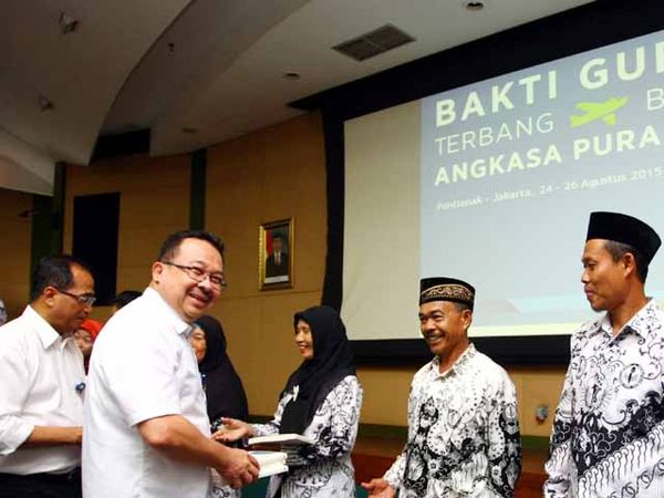 Guru Ngaji Naik Pesawat Gratis