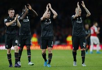 Tambahan satu poin ini menempatkan Liverpool di posisi ketiga dengan 7 poin, hasil dua kemenangan dan satu imbang. Sementara The Gunners di posisi kesembilan dengan 4 poin dari tiga laga. Reuters/Eddie Keogh.
