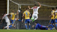 Pada laga yang berkesudahan 2-1 itu, gol Valencia dicetak oleh Negredo. Sementara 2 gol Monaco hasil kreasi Andrea Raggi dan  Uwa Echiejile. REUTERS/Eric Gaillard.