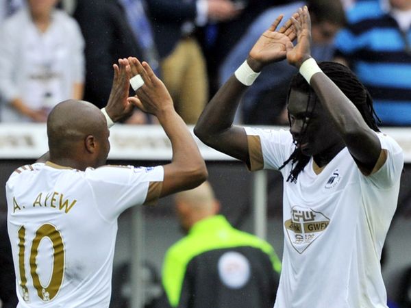 Swansea Tundukkan MU 2-1