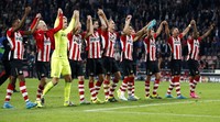 Para pemain PSV Eindhoven merayakan kemenangan. Andrew Couldridge/Reuters/detikFoto.