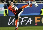 Tundukkan Shakhtar, Madrid Juara Grup
