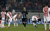 Arsenal pun mengoleksi sembilan poin dan berhak finis posisi kedua grup. Alkis Konstantinidis/Reuters/detikFoto.
