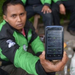 Ojek Berbasis Aplikasi dan Mimpi Smart City