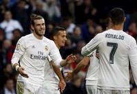 Tambahan tiga poin tak mengubah posisi Madrid di klasemen. Mereka masih menempati urutan tiga dengan nilai 33 dari 16 pekan. Sergio Perez/Reuters/detikFoto.
