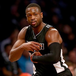 Wade Motori Kebangkitan Heat di Markas Magic