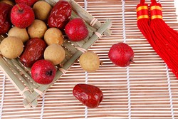 Manisan Kelengkeng dan Jau Gok, Camilan Simbolik yang Wajib Disajikan (1)