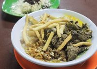 Menyantap Bubur Ayam Bertabur Cheese Stick Plus Es Teler Kopyor Segar