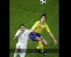 Hujan, Spanyol dan Swedia Menang