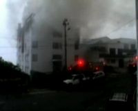 Pesawat Militer Hantam Dua Gedung 