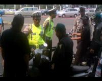 Belasan Pendukung SBY-Boediono Ditilang