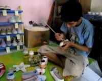 Mendulang Rezeki dari Melukis Sneakers