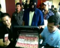 Polisi Bekuk Pengedar Uang Palsu  