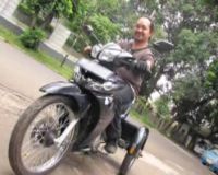 Thayeb dan Motor Roda Tiga