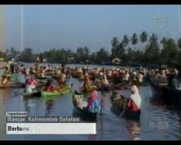 Berburu Jeruk di Pasar Terapung