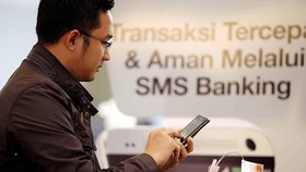 Digempur Pesan Instan, SMS Masih Menguntungkan