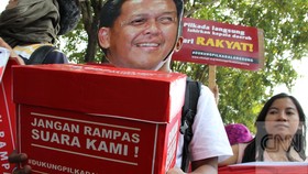 Jokowi Teken UU Pilkada dan Pemda, DPR Siapkan Revisi