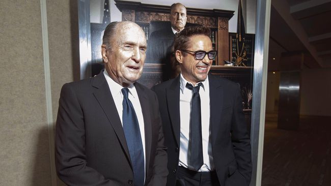Duo Robert memukau penonton di Toronto Film Festival 2014. Robert Downey Jr. dan Robert Duvall, pemeran di film The Judge, punya kisah khusus.