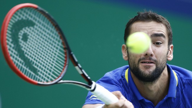 Juara Amerika Terbuka Maric Cilic secara mengejutkan kandas di putaran pertama turnamen Shanghai Terbuka di tangan Ivo Karlovic dalam pertarungan tiga set.