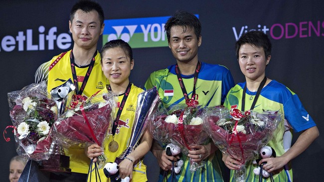 Tontowi Ahmad/Liliyana Natsir berhasil merebut gelar Perancis Terbuka setelah mengalahkan pasangan asal Inggris,&nbsp;Chris Adcock/Gabrielle Adcock.