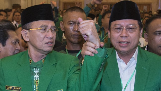 Suryadharama Ali melaporkan Romy dan Emron atas tuduhan pencemaran nama baik dan penggunaan foto serta atribut partai tanpa izin ke Bareskrim.