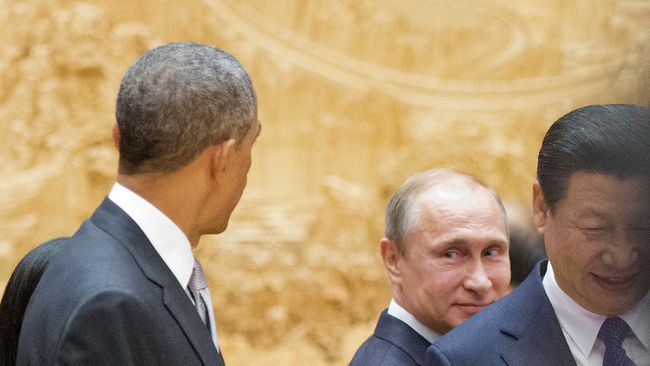 Pertemuan Canggung Obama Dan Putin Di Apec