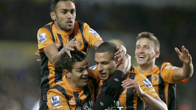 Melalui gol menit-menit akhir, Tottenham Hotspur menundukkan tuan rumah Hull City 2-1 pada laga yang berjalan di Stadion KC, Hull.