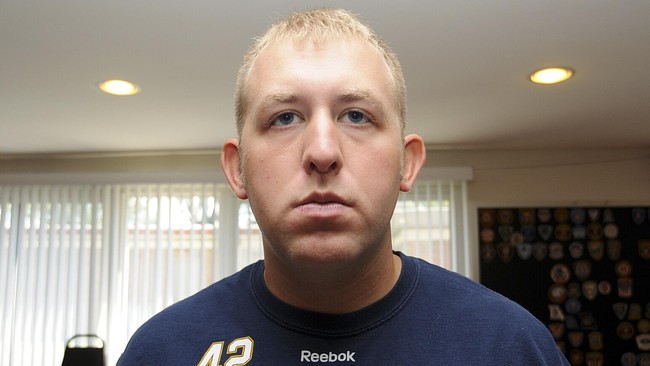 Darren Wilson mengaku terpaksa melepaskan tembakan karena nyawanya terancam saat diserang Michael Brown, pemuda 18 tahun yang bertubuh bongsor.