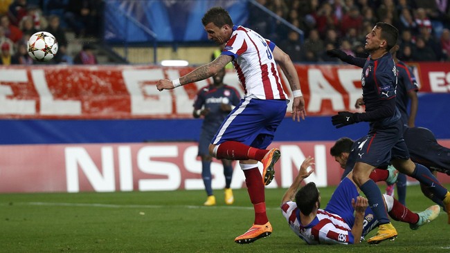 Atletico Madrid menjadi tim pertama dari Grup A yang lolos ke babak 16 besar Liga Champions setelah mengalahkan Olympiakos di Vicente Calderon, Rabu (26/11).