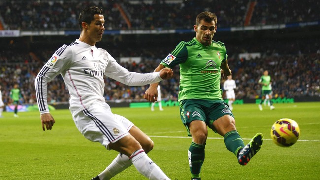 Pengelola Liga Spanyol melaporkan Real Madrid ke Komisi Anti-Kekerasan karena lagu-lagu bernada hinaan untuk Barcelona yang dinyanyikan pendukung Madrid.