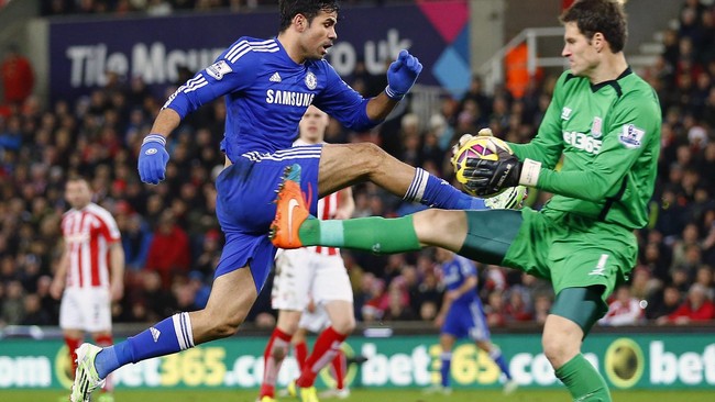 Pemain Chelsea dapat bergembira seutuhnya&nbsp;merayakan Natal usai pecundangi Stoke City 2-0 dalam lanjutan Liga Inggris di Stadion Britania, Selasa (23/12).