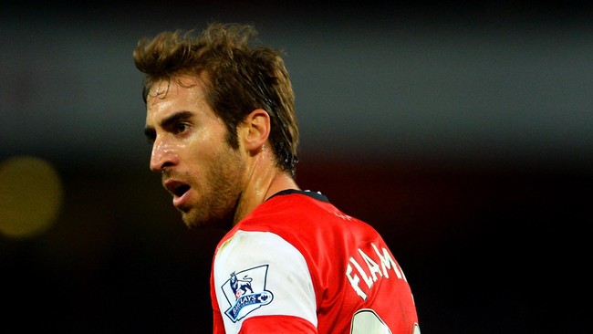 Mantan pemain bertahan Inggris, Phil Neville menyebut&nbsp;permainan gelandang Arsenal Mathieu Flamini saat melawan Liverpool ibarat sebuah penyeka kaca mobil.
