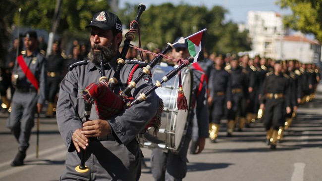 Amnesty International mengatakan Hamas bertanggung jawab atas kejahatan perang terhadap warga sipil di Jalur Gaza selama perang dengan Israel tahun lalu.