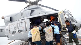 Pencarian Udara Diperluas Meski Awan Badai Mengintai