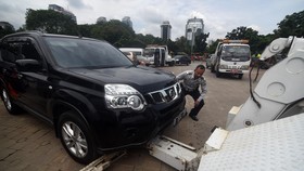 Polisi Tak Ikut Campur Tertibkan Mobil Parkir Sembarangan