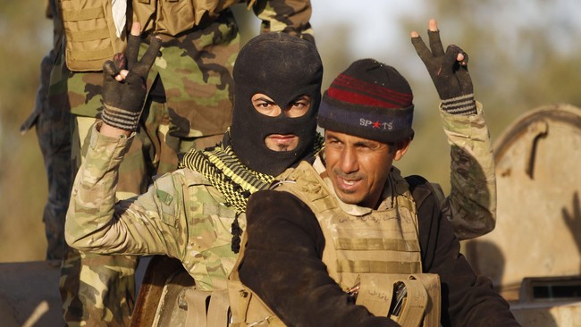 Pemerintah Irak berusaha merampungkan pertempuran Tikrit dengan pasukan gabungan dari milisi Syiah dan kelompok suku Sunni.