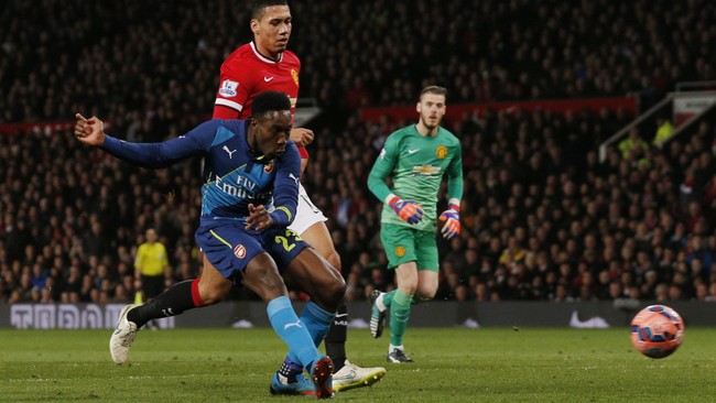 Danny Welbeck berhasil membuat Manchester United tersingkir dari Piala FA. Welbeck jadi mimpi buruk United usai mencetak gol kemenangan bagi Arsenal.