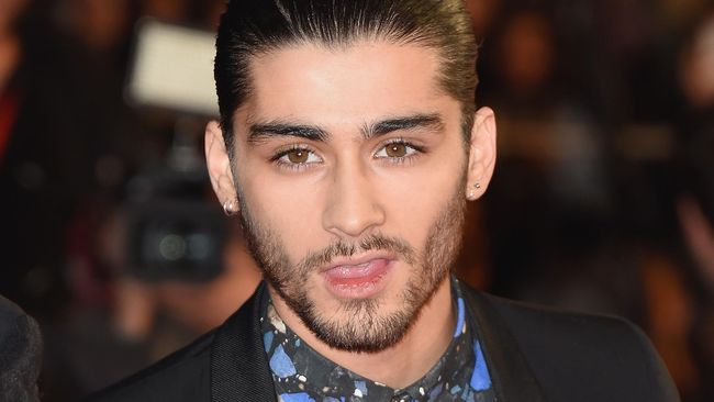 Sama-sama move on, sosok Zayn Malik tidak lagi "menghantui" One Direction yang saat ini masih melanjutkan tur konser kelilingnya.