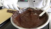 Cokelat Surga dari Afrika Bisnis cokelat sedang menggeliat di Afrika. Dibuat dari bahan baku lokal, dikemas secara mewah dan dijual di toko megah tak ubahnya toko perhiasan.