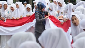 Polemik Wajib Jilbab Padang, Perda Intoleran Didesak Dicabut