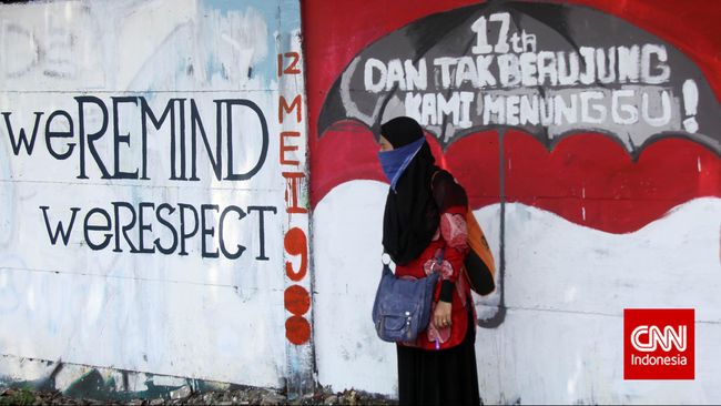 Mural yang menjadi "taman bermain" seniman lokal dan mancenegara kali ini hanya berupa kanvas putih dengan sapuan cat hitam.
