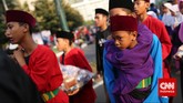 Laga Seribu Pendekar di Jantung Ibu Kota Minggu pagi yang meriah di sekitar kawasan Menteng, Jakarta Pusat, kala digelar Pangsi Betawi yang menampilkan atraksi seribu pendekar silat.