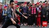 Laga Seribu Pendekar di Jantung Ibu Kota Minggu pagi yang meriah di sekitar kawasan Menteng, Jakarta Pusat, kala digelar Pangsi Betawi yang menampilkan atraksi seribu pendekar silat.