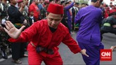 Laga Seribu Pendekar di Jantung Ibu Kota Minggu pagi yang meriah di sekitar kawasan Menteng, Jakarta Pusat, kala digelar Pangsi Betawi yang menampilkan atraksi seribu pendekar silat.